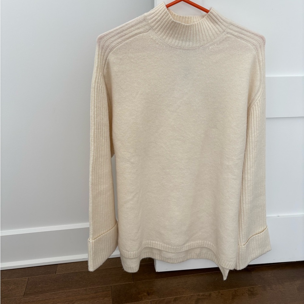 Cream Sweater for women for M or Large size. New